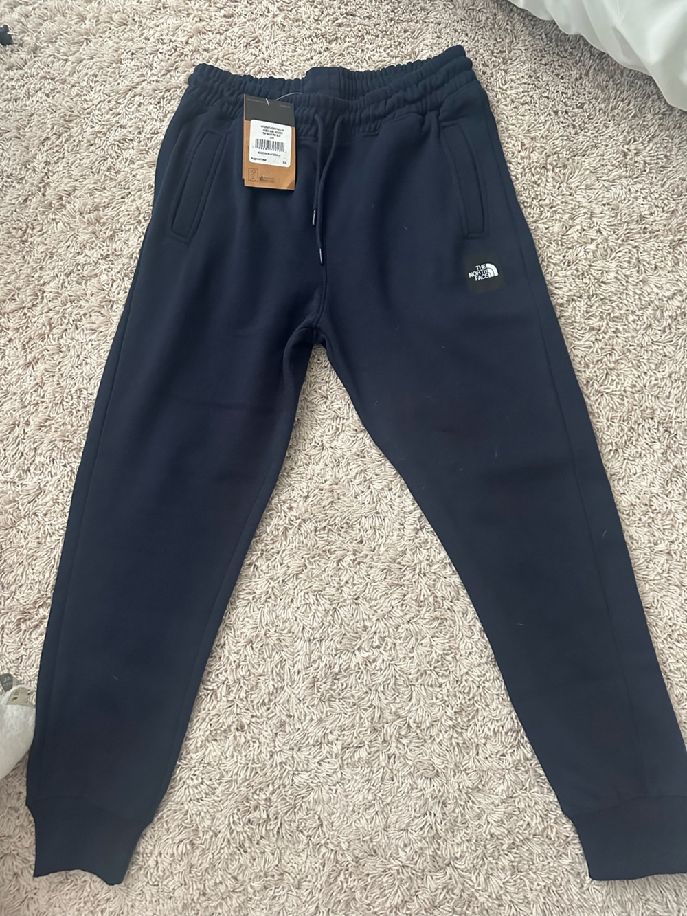 The North Face navy joggers Large